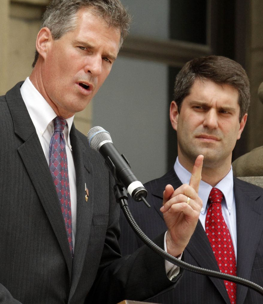 Tim Burns, right, Republican candidate for the congressional seat vacated by John Murtha, campaigns with Sen. Scott Brown, R-Mass., on the steps of the Washington County Courthouse in Washington, Pa., Friday, May 14, 2010. (AP Photo/Gene J. Puskar)
