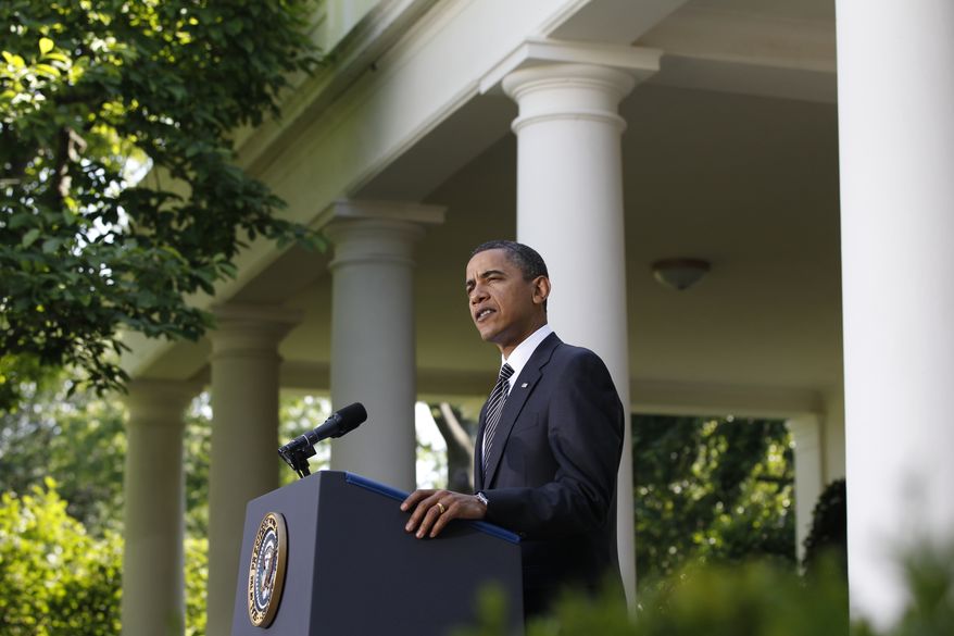 President Barack Obama makes a statement on financial reform and Wall Street, Thursday, May 20, 2010, in the Rose Garden of the White House in Washington. (AP Photo/Charles Dharapak)