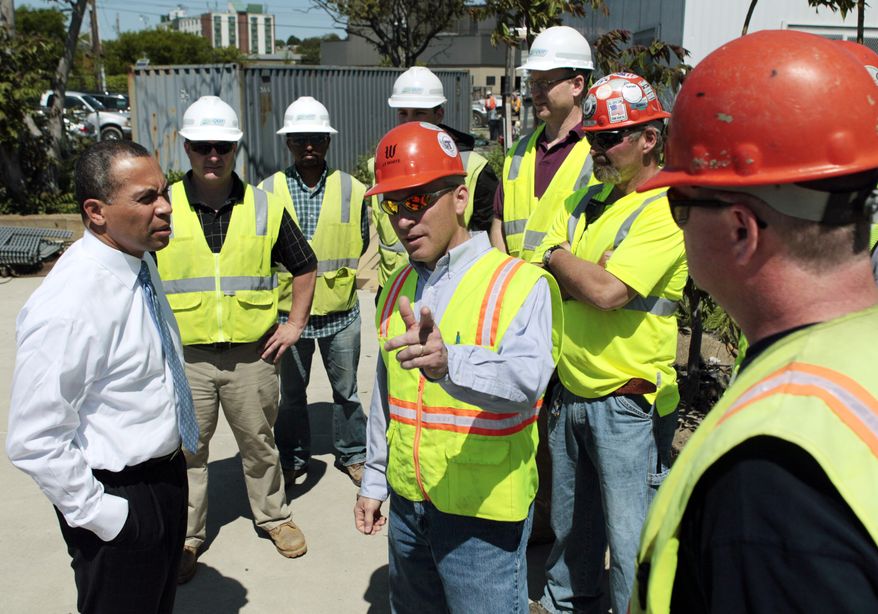 Massachusetts Gov. Deval Patrick speaks with workers prior to a news conference at the Chelsea Street Bridge construction site in Chelsea, Mass., Thursday, May 20, 2010. Massachusetts added more than 19,000 jobs last month, helping the state&#39;s unemployment rate drop to 9.2 percent from 9.3 percent the previous month, and indicating an economic recovery. The state Executive Office of Labor and Workforce Development announced Thursday that April&#39;s job gains were the largest monthly increase in 17 years. The national unemployment rate for April was 9.9 percent. (AP Photo/Elise Amendola)