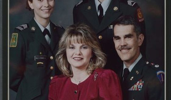 Lt. Col. Stephen D. McConnell is seen here in March 1998 with wife Kimberly, daughter Gretchen and son Tanner. Col. McConnell, 56, committed suicide on June 1 in Williamsburg, Va. (McConnell family photographs)