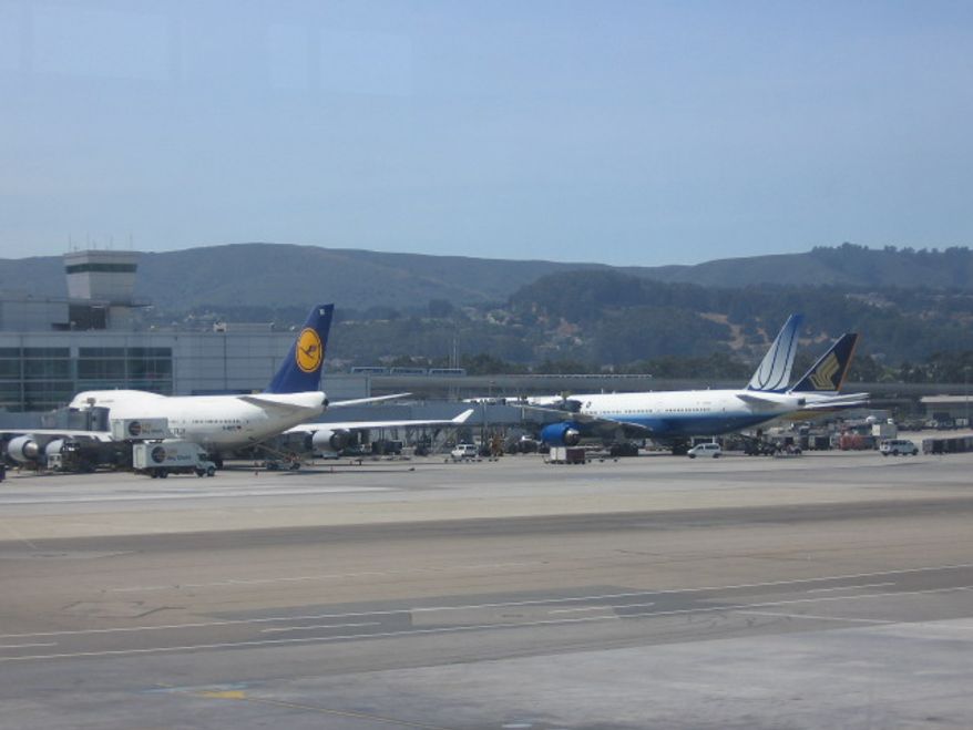 Lufthansa, United Airlines and Singapore Airlines aircraft at the San Francisco International Airport (Nicholas Kralev/The Washington Times)