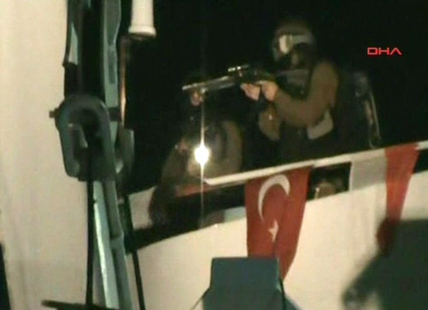 ** FILE ** This video image released by the Turkish aid group IHH on Monday, May 31, 2010, purports to show Israeli soldiers aiming a gun on the deck of a Turkish ship, part of an aid convoy heading to the Gaza Strip, after Israeli soldiers boarded the vessel in international waters off the Gaza coast. Israeli commandos on Monday stormed six ships carrying hundreds of pro-Palestinian activists on an aid mission to the blockaded Gaza Strip, killing at least 9 people and wounding dozens after encountering unexpected resistance as the forces boarded the vessels. (AP Photo/IHH via APTN)