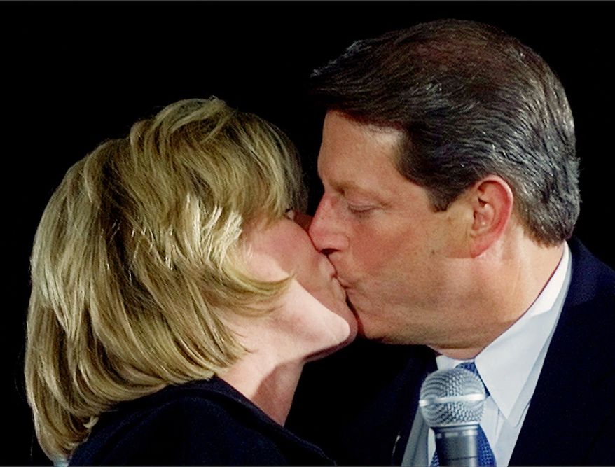 In this Nov. 5, 2000 file photo, then-Democratic presidential candidate Vice President Al Gore gets a kiss from his wife Tipper during a campaign rally at the University of Michigan in Dearborn, Mich. The Gores announced Tuesday that they are separating after 40 years of marriage. (AP Photo/Doug Mills, File)