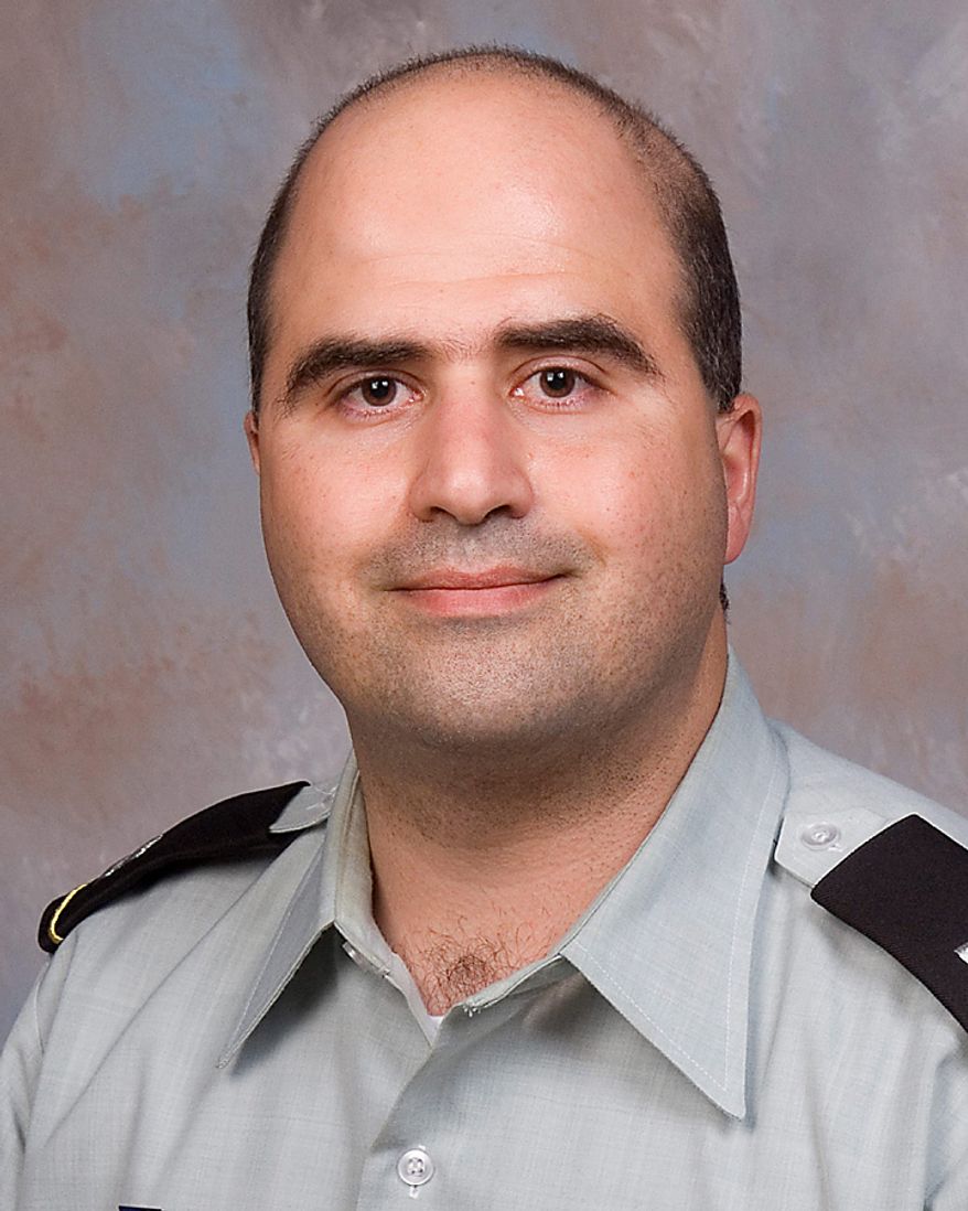 The 2007 picture provided by the Uniformed Services University of the Health Sciences shows Maj. Nidal Hasan when he began his disaster and military psychiatry fellowship. (AP Photo/Uniformed Services University of the Health Sciences, File)