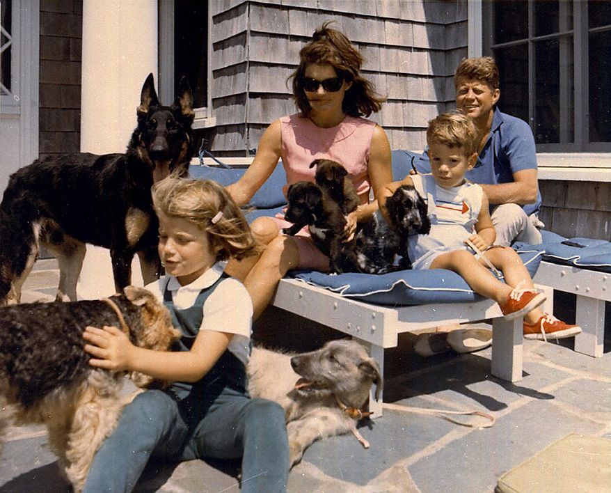 President John F. Kennedy and his family vacation with their pets in this undated photo. From left are daughter Caroline, first lady Jacqueline Kennedy, John Jr. and the president. (AP Photo)