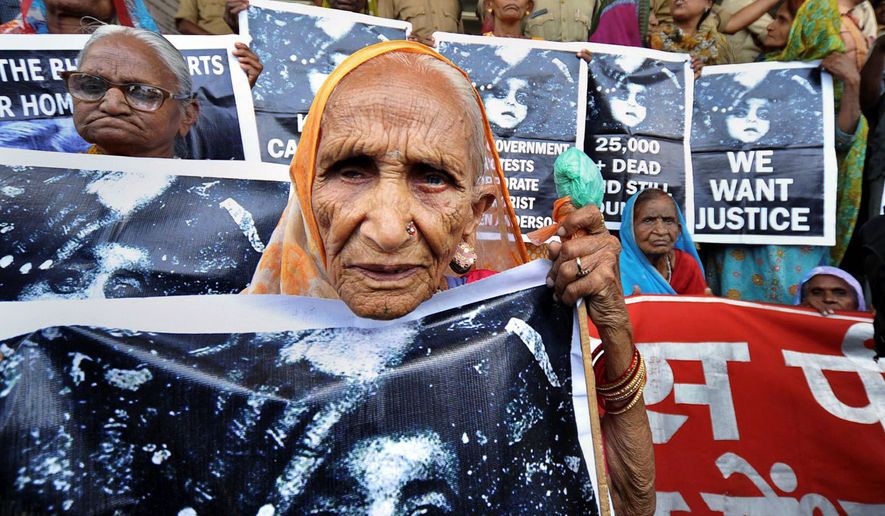 OUTRAGED: Survivors demand more than the two-year prison sentences and $2,175 in fines for the former managers of the Union Carbide subsidiary who were convicted in the Bhopal, India, gas leak of December 1984. (Associated Press)