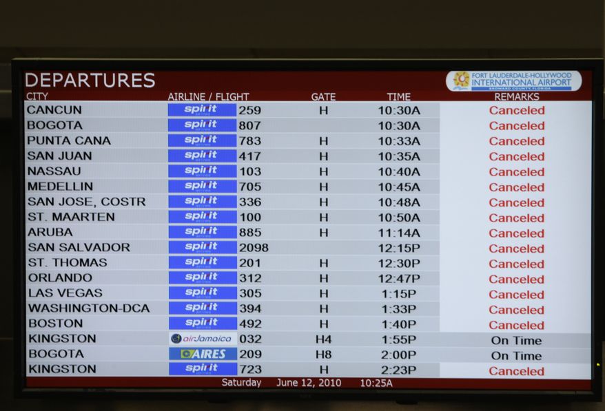 A monitor showing departing flights shows Spirit Airlines' flights canceled due to a strike by pilots at the Fort Lauderdale-Hollywood International Airport in Fort Lauderdale, Fla. Saturday, June 12, 2010. (AP Photo/Lynne Sladky)