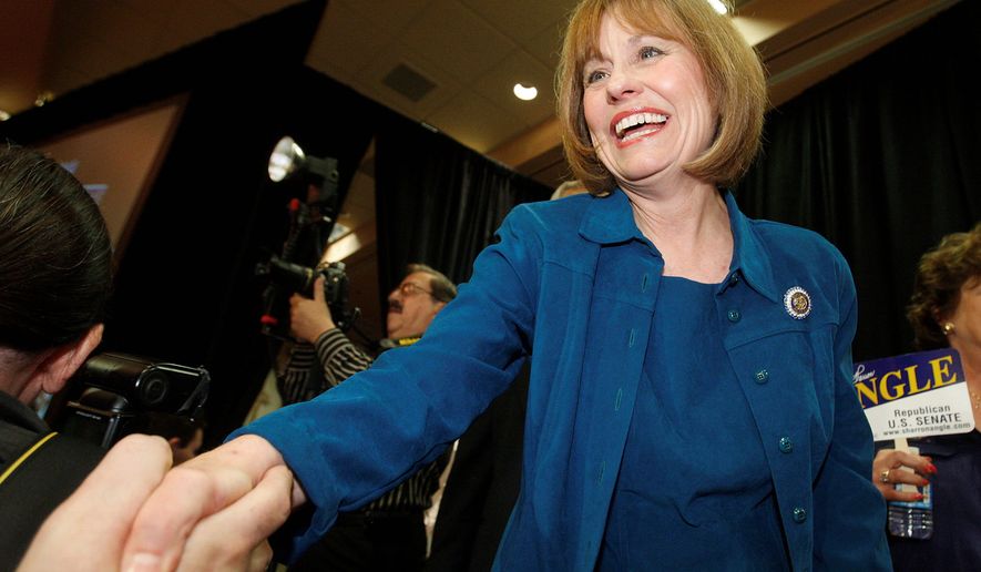 **FILE** Sharron Angle shakes hands of supporters in Las Vegas on June 8, 2010, after winning the Nevada Republican U.S. Senate primary election race. Angle will face Sen. Harry Reid in November. (Associated Press)