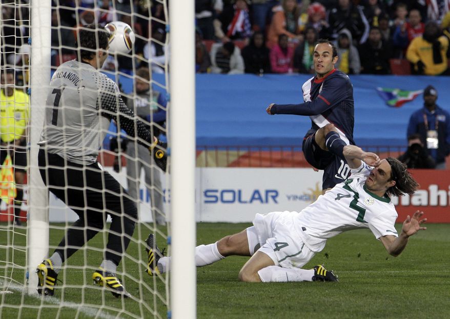 United States&#x27; Landon Donovan, right back, scores during the World Cup group C soccer match between Slovenia and the United States at Ellis Park Stadium in Johannesburg, South Africa, Friday, June 18, 2010. (AP Photo/Elise Amendola)