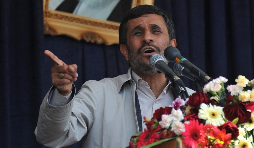Iranian President Mahmoud Ahmadinejad speaks at a public gathering in Iran. He says Tehran is willing to deal with the outside world but resents U.N. sanctions. (Associated Press)