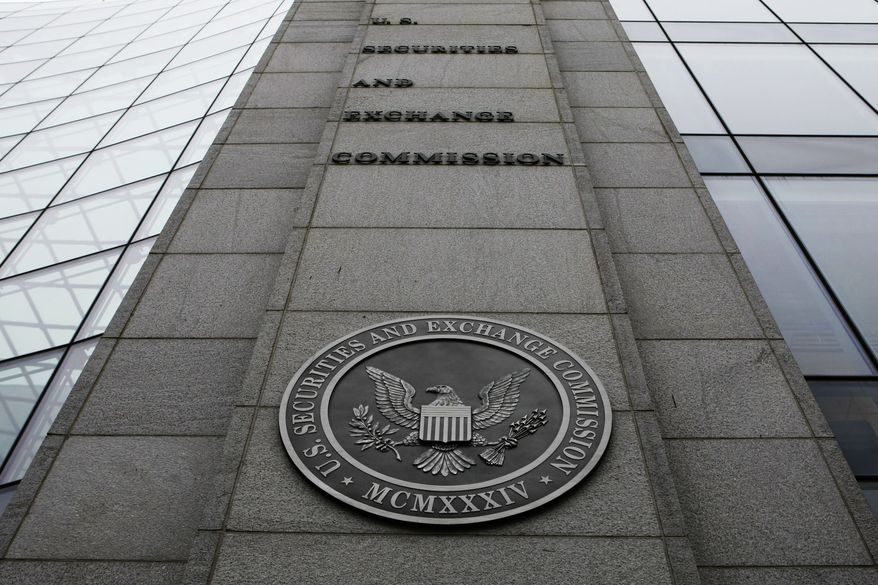 The Securities and Exchange Commission on Monday filed civil fraud charges against an investment adviser and his firm in connection with complex securities tied to mortgages during the housing market bust. (AP Photo/File)