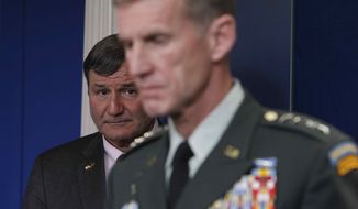 ** FILE ** In this May 10, 2010, file photo, Commander of U.S. and NATO forces in Afghanistan Gen. Stanley McChrystal, and U.S. Ambassador to Afghanistan Karl W. Eikenberry brief reporters ahead of Afghan President Hamid Karzai&#39;s visit at the White House. (AP Photo/Charles Dharapak)