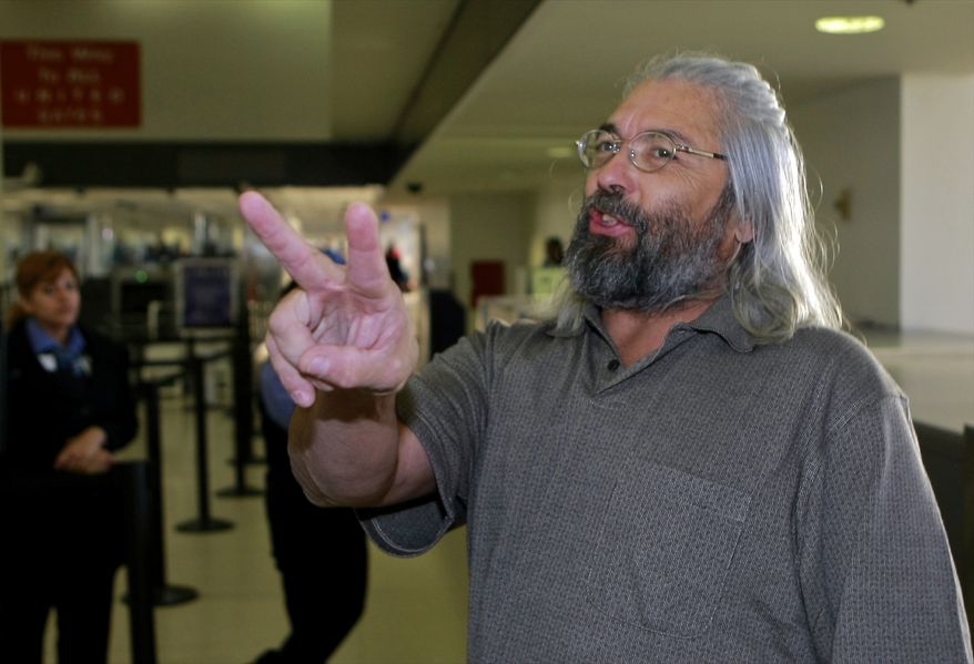 Gary Faulkner gets ready to board a connection flight, back home to Colorado, on Wednesday afternoon, after arriving at Los Angeles International Airport on Wednesday, June 23, 2010, in Los Angeles. Mr. Faulkner, on a solo mission to hunt down Osama bin Laden, is back in the United States, 10 days after authorities found him in the woods of northern Pakistan with a pistol, a sword and night-vision equipment. (AP Photo/Damian Dovarganes)