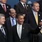President Obama (center) is joined Sunday by Canadian Prime Minister Stephen Harper (left), Ethiopian Prime Minister Meles Zenawi, Turkish Prime Minister Recep Tayyip Erdogan (upper right) and King Abdullah of Saudi Arabia during the official family photo at the G20 Summit in Toronto. (AP Photo/Lefteris Pitarakis)