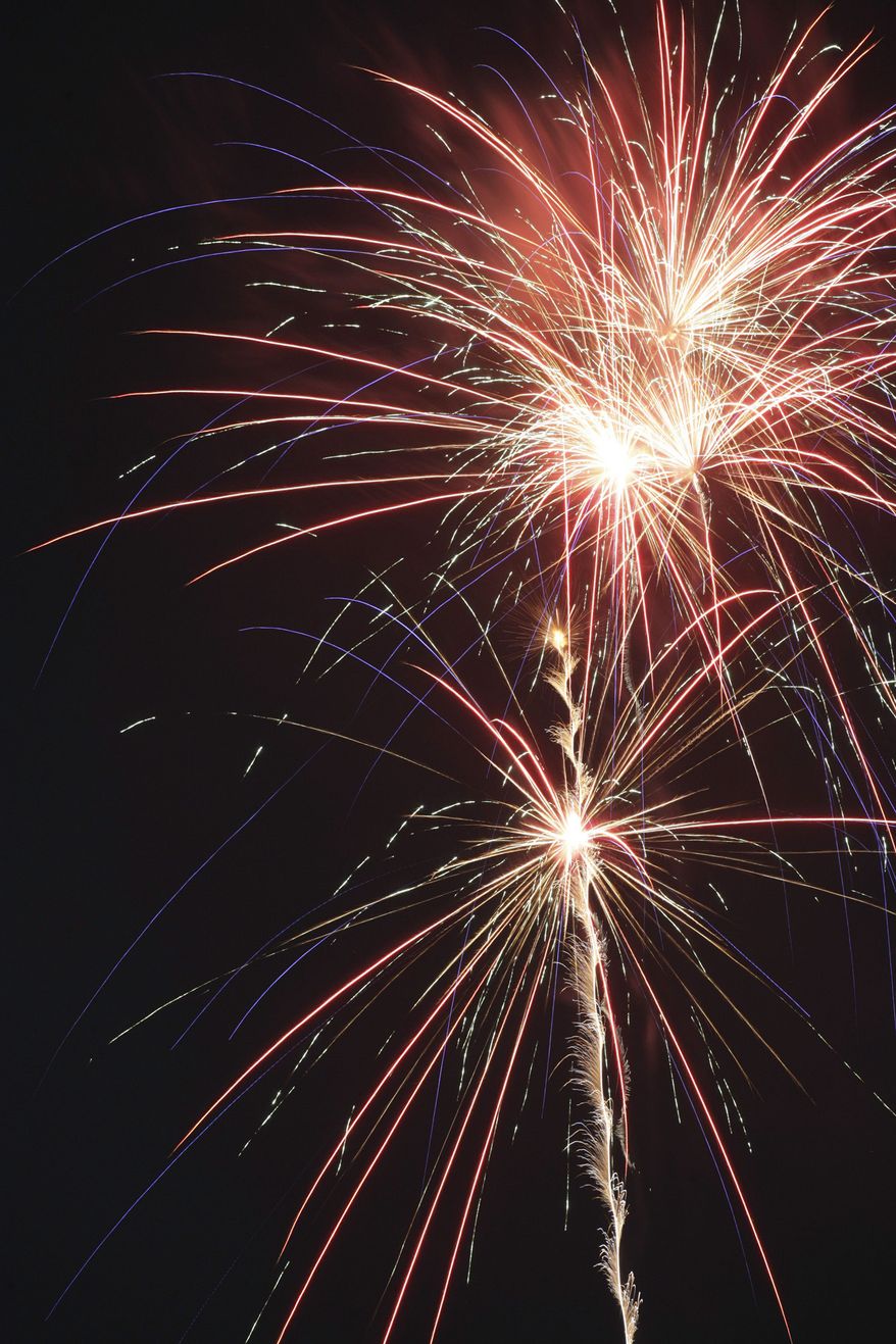 ** FILE ** This July 4, 2008 file photo shows fireworks as they burst in the night sky of Bullard, Texas as part of its Independence Day celebration. (AP Photo/Dr. Scott M. Lieberman, FILE) A program that offers free cab rides home to people in the Washington region who have been drinking too much around certain holidays has been salvaged for Independence Day.