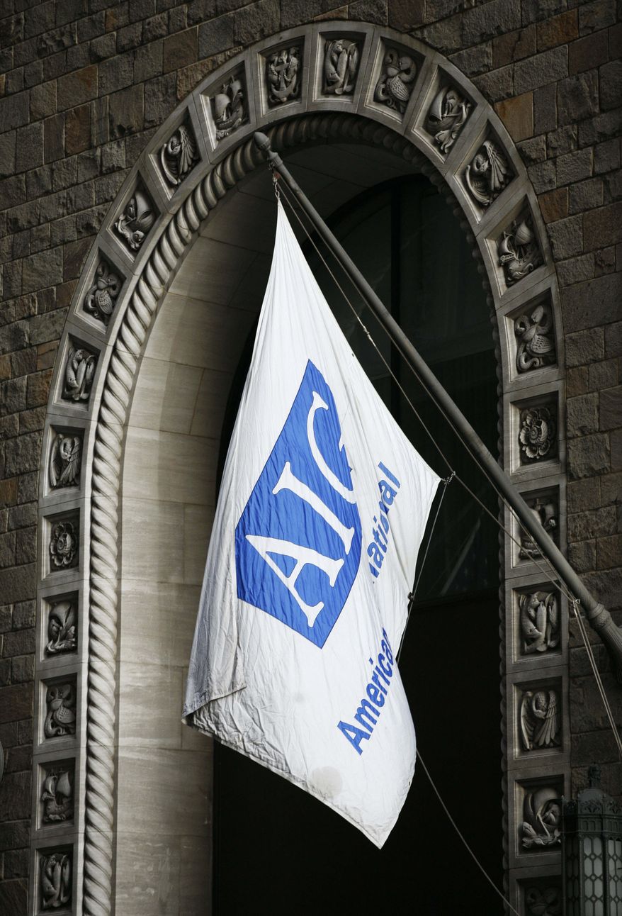 ** FILE ** This March 18, 2009 file photo, shows the exterior of an AIG office building in New York. A former CEO of AIG says he told the truth about the company's losses while defending its compensation. (AP Photo/Mark Lennihan, file)