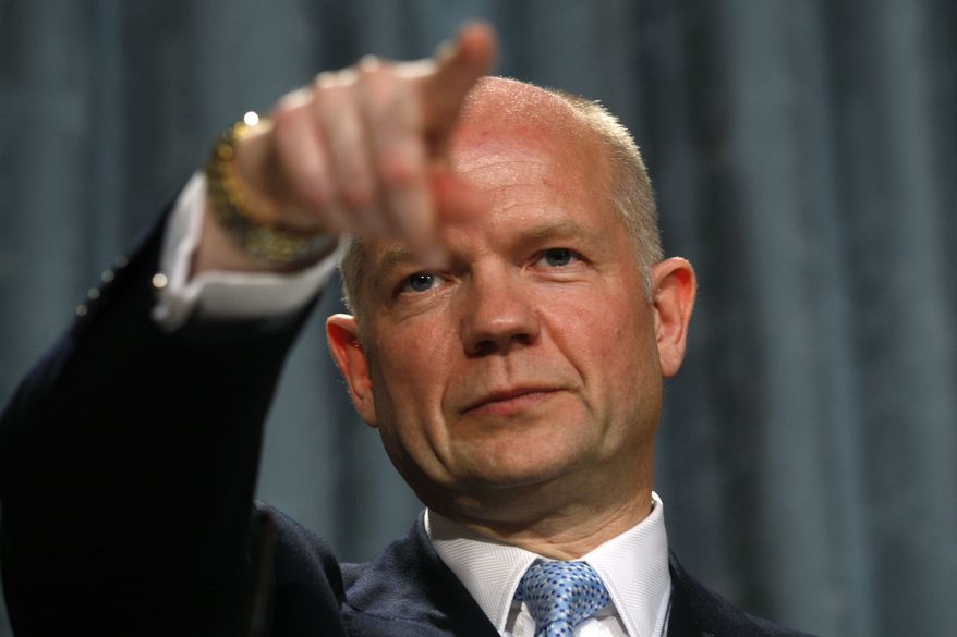 ** FILE ** British Foreign Secretary William Hague delivers his first foreign policy speech at the Foreign and Commonwealth Office in London on Thursday, July 1, 2010. (AP Photo/Sang Tan, Pool)
