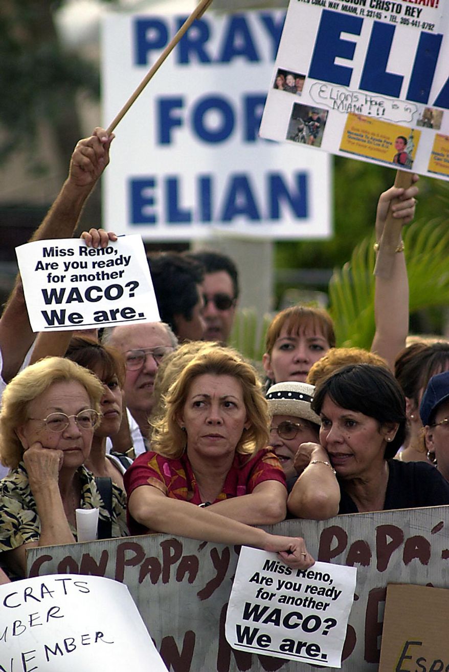 Possible break-thru in the Elian Gonzalez case ... Elian supporters wait near his home Monday afternoon, April 3, 2000. ( Sean Dougherty / The Washington Times )