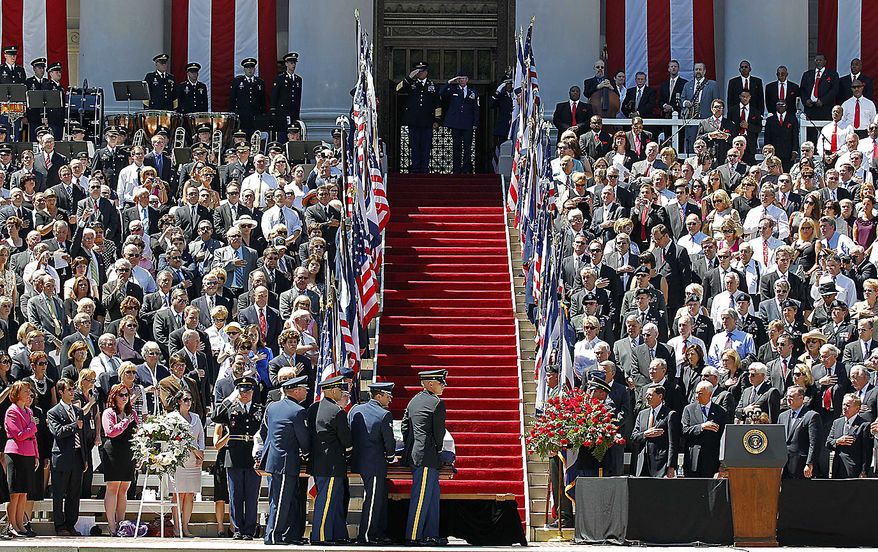 An honor guard carries the casket of Sen. Robert Byrd into place during a memorial service at the Capitol in Charleston, W.Va., Friday July 2, 2010. (AP Photo/Gene J. Puskar)