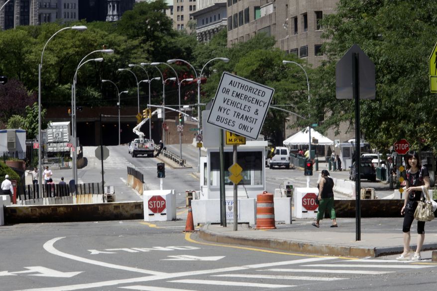 This Thursday, July 1, 2010 photo shows a sign warning vehicles that Park Row in lower Manhattan is closed to traffic. Following the Sept. 11, 2001, terror attacks, the New York Police Department barricaded off its headquarters. (AP Photo/Mary Altaffer)