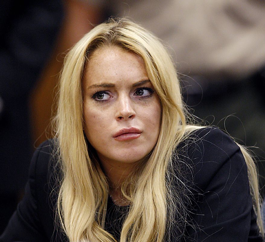 Actress Lindsay Lohan appears in court during a probation status hearing relating to her August 2007 no contest pleas to two counts each of DUI and being under the influence of cocaine, along with a reckless driving charge, at the Beverly Hills Municipal Courthouse, in Beverly Hills, California on July 6, 2010. UPI/David McNew/Pool