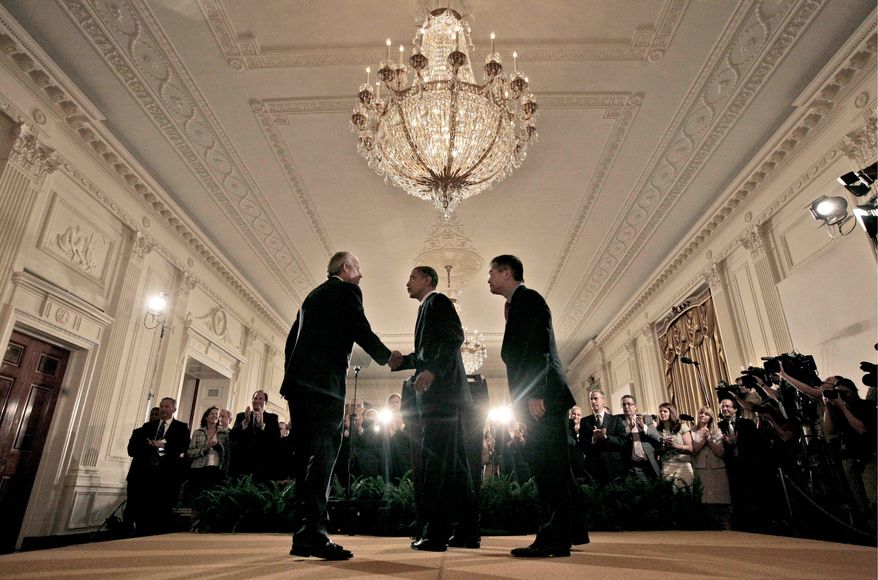 President Barack Obama, center, shakes hands with Boeing President, Chairman and CEO Jim McNerney, Jr., left, as Commerce Secretary Gary Locke looks on, after speaking about exports, jobs and the economy on Wednesday, July 7, 2010, in the White House. (AP Photo/Pablo Martinez Monsivais)
