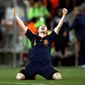 Spain&#39;s Andres Iniesta celebrates after scoring the game-winning goal during the World Cup final at Soccer City in Johannesburg on Sunday. Spain grabbed its first World Cup title. (Associated Press)
