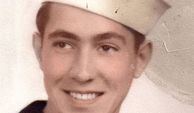 This undated photo provided by the family shows Ensign Robert Langwell, whose remains, missing since the Korean War, were laid to rest in Arlington National Cemetery on Monday. (AP Photo/Langwell Family)