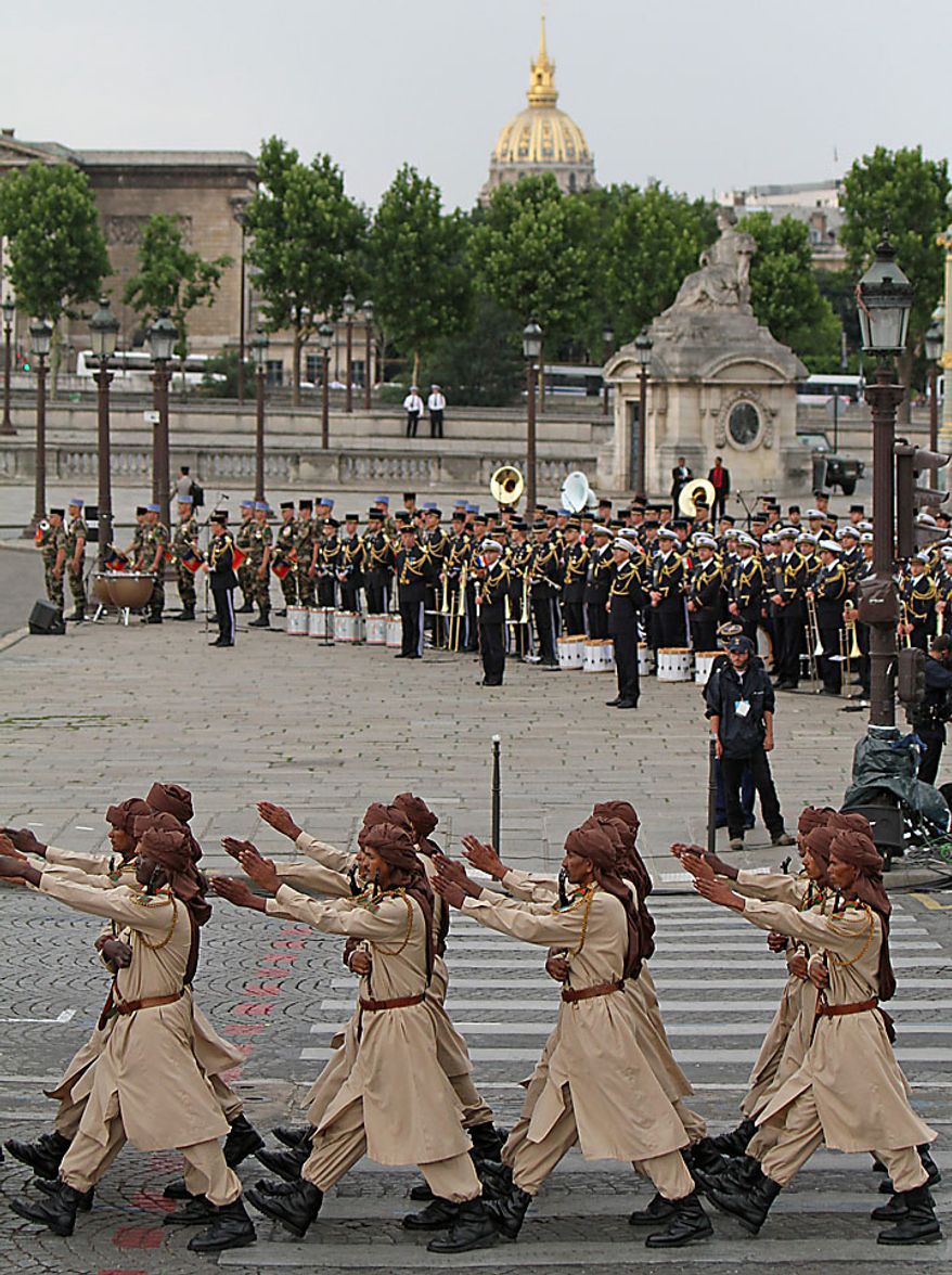 Soldiers from Chad march in the annual military parade at the Place de la Concorde during the Bastille Day celebrations in Paris on Wednesday, July 14, 2010. Leaders and soldiers from 13 former French colonies in Africa, celebrating five decades of independence, were invited to take part in this year's parade. (UPI/David Silpa)
