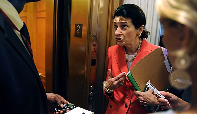 Sen. Olympia Snowe, R-ME, speaks with a reporter after voting yes on a cloture vote on the financial reform bill on Capitol Hill in Washington on July 15, 2010. The vote passed which allows a final vote on passage of the bill later today.   UPI/Roger L. Wollenberg