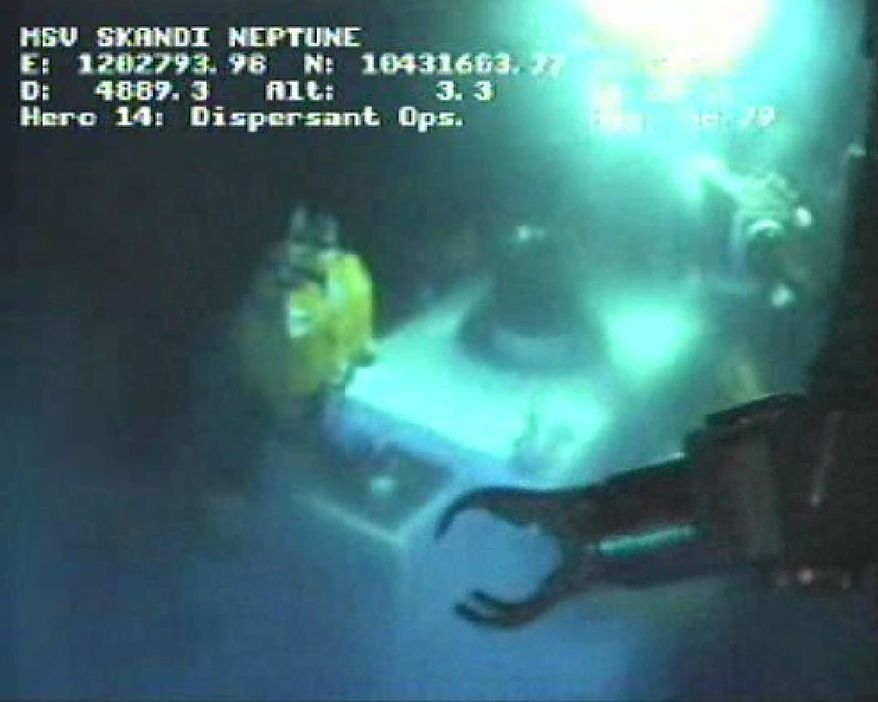 This image taken from video provided by BP PLC at 14:27 CDT, shows that oil has stopped flowing from the new 75-ton cap atop the site of the Deepwater Horizon oil spill in the Gulf of Mexico Thursday, July 15, 2010. BP vice president Kent Wells said the oil stopped flowing into the water at 14:25 CDT after engineers gradually dialed back the amount of crude escaping through the last of three vents in the cap, an 18-foot-high metal stack of pipes and valves. (AP Photo/BP PLC)