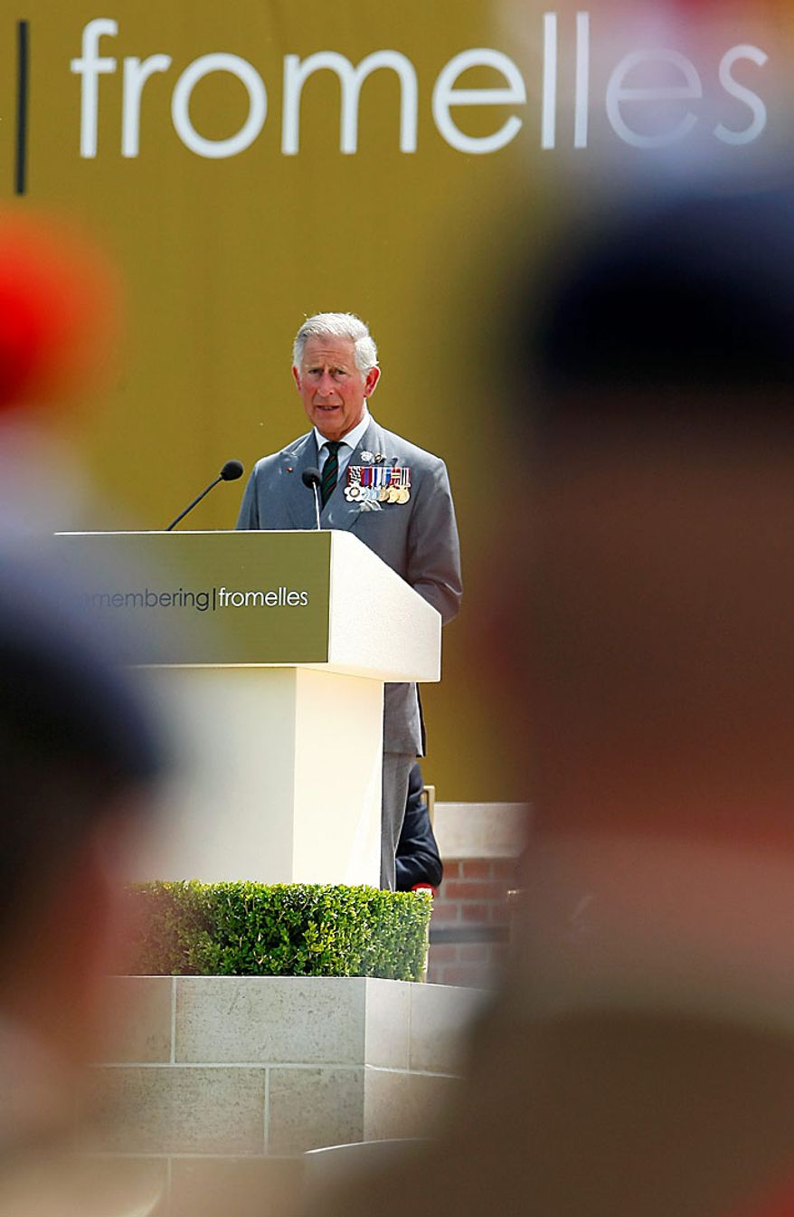 Britain's Prince Charles delivers a speech during the service of rededication at the Fromelles (Pheasant Wood) Military Cemetery, northern France, Monday, July 19, 2010. Ceremonies were marking the 94th anniversary of the World War I Battle of the Somme. (AP Photo/Michel Spingler)