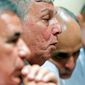 Cuban dissident Ricardo Gonzalez (center) speaks out Thursday in Madrid. Other dissidents have to decide if they will stay in Cuba and try to win U.S. asylum or leave for exile in Spain. (Associated Press)