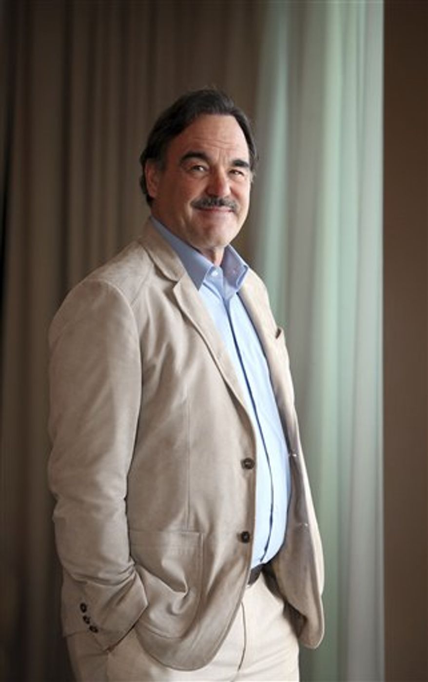 FILE - In this May 13, 2010 file photo, U.S. film director Oliver Stone poses for a portrait, while promoting "Wall Street: Money Never Sleeps", at the at the 63rd international film festival, in Cannes, southern France. The Academy Award-winning director said Tuesday, July 20, 2010 that the United States mineral wealth was too important to be left in private hands, telling an audience of journalists in central London that those resources "belong to the people." (AP Photo/Mark Mainz, File)