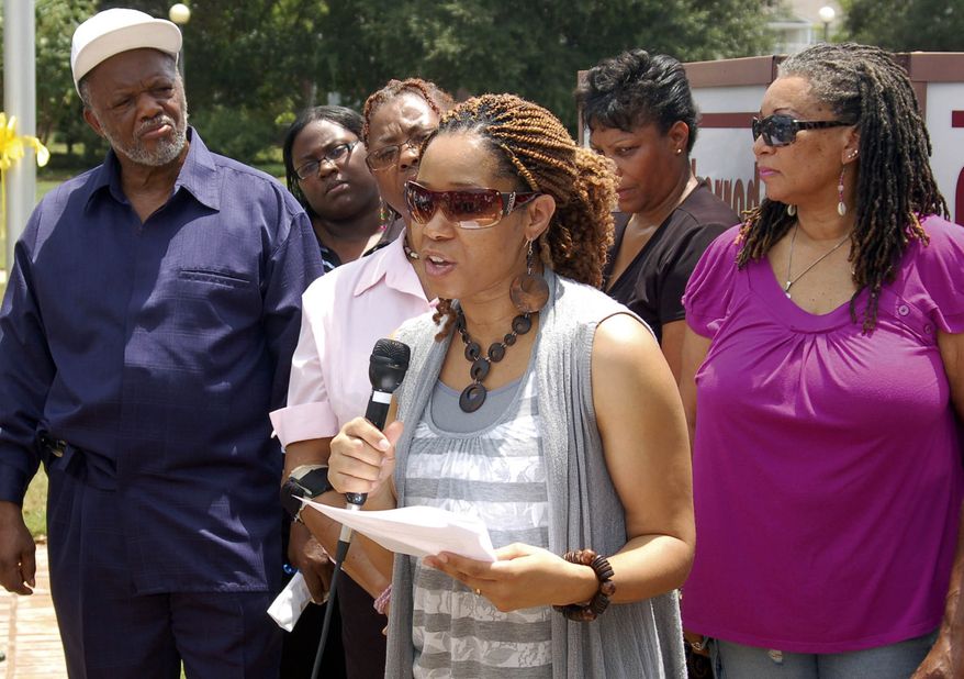 Mikhiela Sherrod, daugher-in-law of Shirley Sherrod, speaks during a rally in Albany, Ga., Wednesday, July 21, 2010. The White House did a sudden about-face Wednesday and begged for forgiveness from the black Agriculture Department employee whose ouster ignited an embarrassing political firestorm over race. She was offered a "unique opportunity" for a new job and said she was thinking it over. (AP Photo/The Albany Herald, Terry Lewis)
