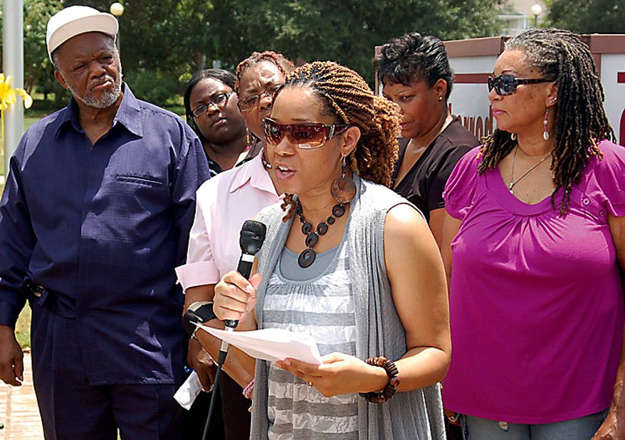 Mikhiela Sherrod, daugher-in-law of Shirley Sherrod, speaks during a rally in Albany, Ga., Wednesday, July 21, 2010. The White House did a sudden about-face Wednesday and begged for forgiveness from the black Agriculture Department employee whose ouster ignited an embarrassing political firestorm over race. (AP Photo/The Albany Herald, Terry Lewis)