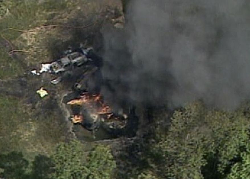 In this frame grab image provided by video from WPXI-TV, a fire rustling from a natural gas well explosion burns in Indianola, Pa., northeast of Pittsburgh on Friday, July 23, 2010. Police reported two persons killed. (AP Photo/WPXI)