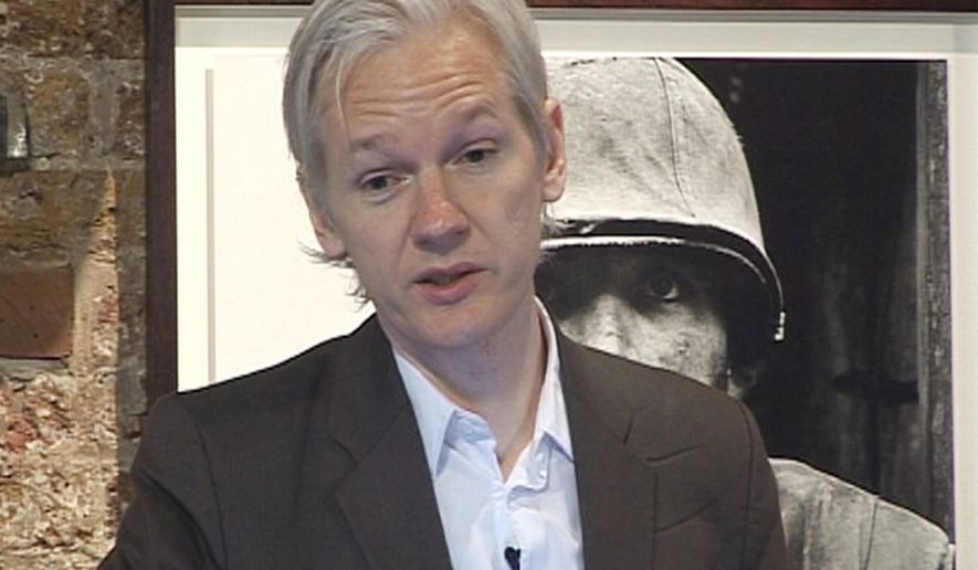Wikileaks founder Julian Assange speaks during a press conference in London on Monday, July 26, 2010, during which he said he believes there is evidence of war crimes in the thousands of pages of leaked U.S. military documents relating to the war in Afghanistan. (AP Photo/Lizzie Robinson, PA)
