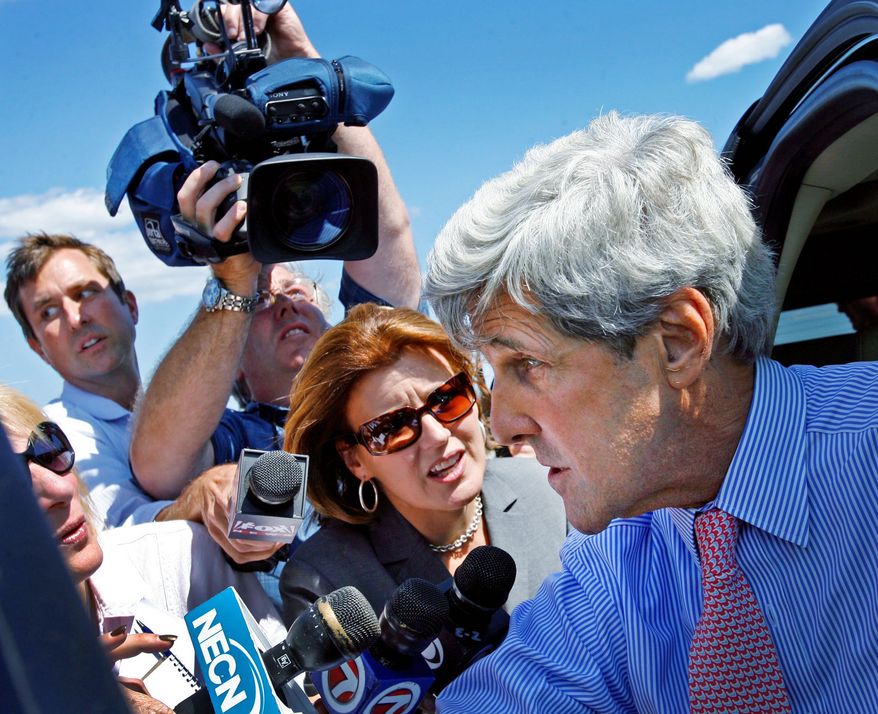 Mr. Kerry speaks to reporters in Weymouth, Mass. He issued a statement saying he plans to pay "the equivalent taxes as if the boat's home-port were currently in Massachusetts." (Associated Press)