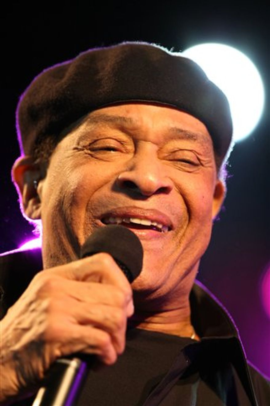 FILE - Seven-time Grammy Award winner, Al Jarreau, performs at Festival Jazz des Cinq Continents in Marseille, France, in this file photo dated July 21, 2010. The 70-year old singer Jarreau has been discharged from hospital, it is announced Sunday Aug.1, 2010, after he suffered from breathing problems in the Alps July 23, and was placed in intensive care. (AP Photo/Claude Paris, File)