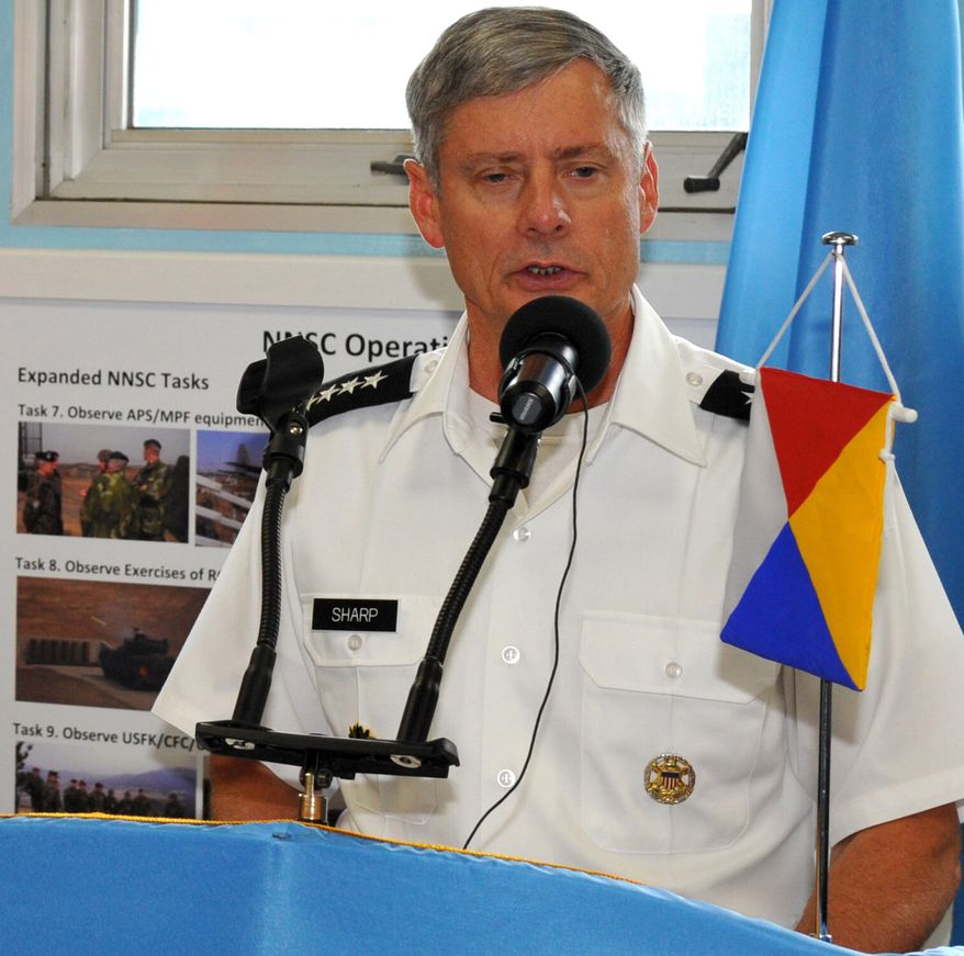 U.S. Army Gen. Walter Sharp, commander of the United Nations Command, speaks at the Neutral Nations Supervisory Commission building in the cross-border village of Panmunjeom in Korea&#39;s Demilitarized Zone on Tuesday, July 27, 2010, to mark the 57th anniversary of the signing the Korean War armistice. (AP Photo/Kim Jae-hwan, Pool)