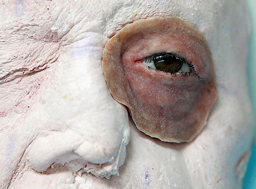 In this photo taken June 23, 2010, a facial prosthetic with an artificial eye is seen in a facial prosthetics lab at Wilford Hall Medical Center in San Antonio, Texas. (AP Photo/Eric Gay)