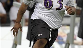 Baltimore Ravens wide receiver Donte&#39; Stallworth catches a pass drills during at the NFL football team&#39;s training camp, Friday, July 30, 2010, in Westminster, Md. (AP Photo/Rob Carr)