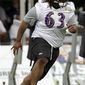 Baltimore Ravens wide receiver Donte&#x27; Stallworth catches a pass drills during at the NFL football team&#x27;s training camp, Friday, July 30, 2010, in Westminster, Md. (AP Photo/Rob Carr)