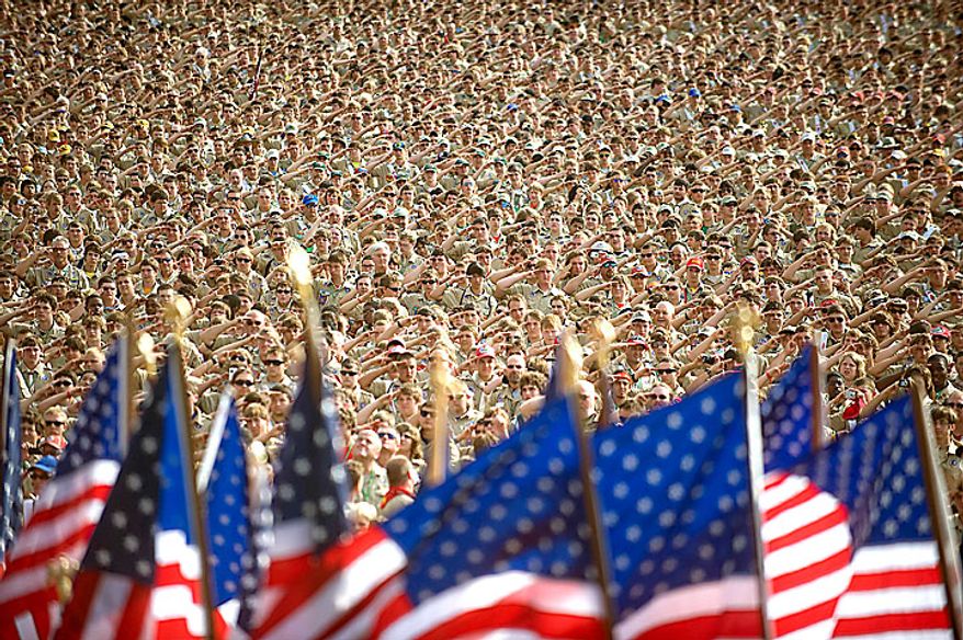 In this Wednesday, July 28, 2010 photo provided by the Department of Defense, more than 45,000 Boy Scouts salute during the singing of the national anthem as part of the Boy Scouts of America 2010 National Scout Jamboree at Ft. AP Hill, Va. (AP Photo/DOD, Cherie Cullen)