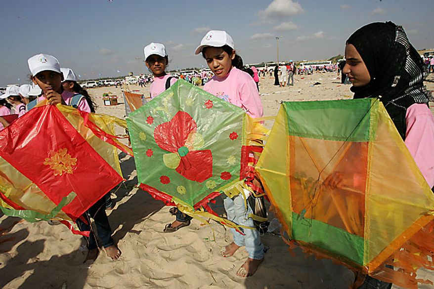 Thousands of Palestinian children in Beit Lahiya, Gaza Strip, fly kites in an attempt to break the world record for the number of kites flying simultaneously. More than 7,200 kites were raised into the air on Thursday, July 29, 2010, setting a new world record in an event sponsored by the United Nations. About 8,000 children attended in the event, Khalil el-Halabi, education program head at the U.N. Relief and Works Agency, said. (UPI/Ismael Mohamad)