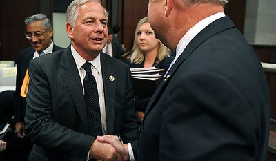 Rep. Gene Green (D-TX) shakes hands with Rep. Jo Bonner (R-AL) after the two testified before a House Ethics Subcommittee hearing on the alleged ethics violations conducted by Rep. Charlie Rangel, in Washington on July 29, 2010.  Bonner and Green announced Rangel&#39;s charges which include allegations including failure to pay taxes, misuse of rental property and soliciting funds for a center at City College of New York.  UPI/Kevin Dietsch