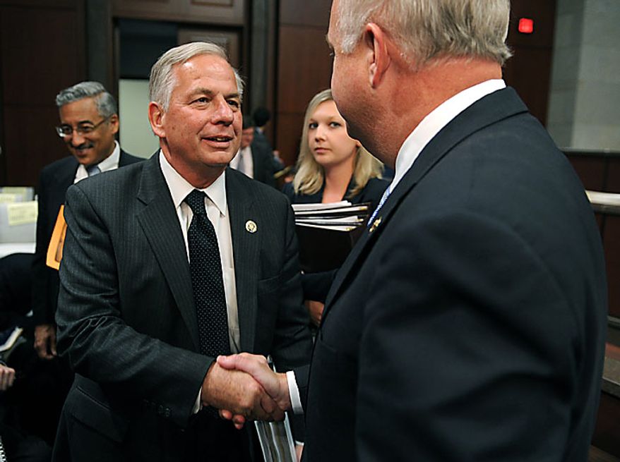 Rep. Gene Green (D-TX) shakes hands with Rep. Jo Bonner (R-AL) after the two testified before a House Ethics Subcommittee hearing on the alleged ethics violations conducted by Rep. Charlie Rangel, in Washington on July 29, 2010. Bonner and Green announced Rangel's charges which include allegations including failure to pay taxes, misuse of rental property and soliciting funds for a center at City College of New York. UPI/Kevin Dietsch
