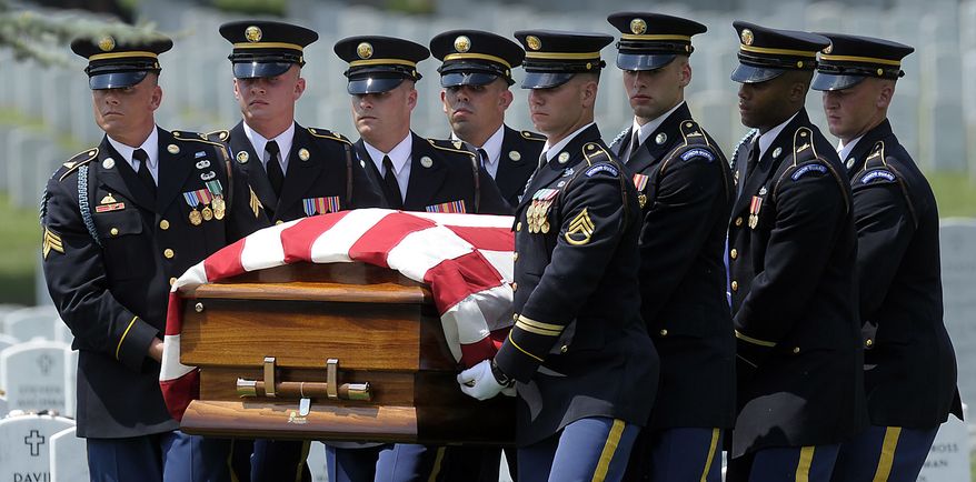 The casket of Army Pfc. David T. Miller is carried during his funeral service at Arlington National Cemetery in Arlington, Va., Wednesday, July 28, 2010. Miller was killed in Afghanistan. Miller of Wilton, N.Y., died June 21 in Afghanistan. (AP Photo/Susan Walsh)
