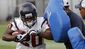 Slaton_Texans_Camp_Football.sff.jpg